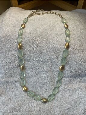 Elegant Pale Green Bead Necklace with Gold Accents